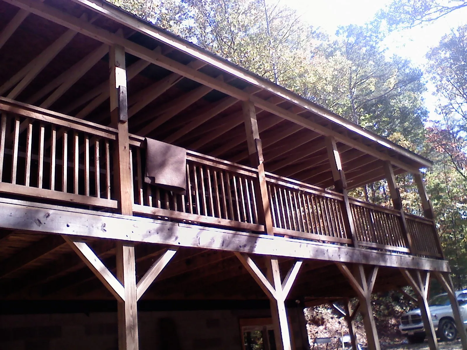 Timber framing under a new elevated porch and deck — Roof Leak Repair in Royalton by Roofing Brothers